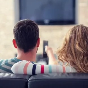 Which Love Islander Matches Your Personality (1) couple Cuddling up watching a movie